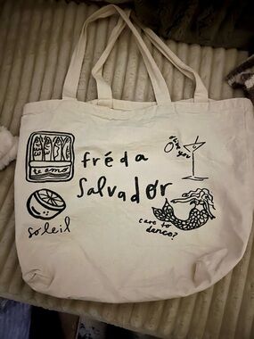 Canvas Tote Bag with Black Graphic Print - Cream colored.